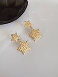 Load image into Gallery viewer, Mali star earrings
