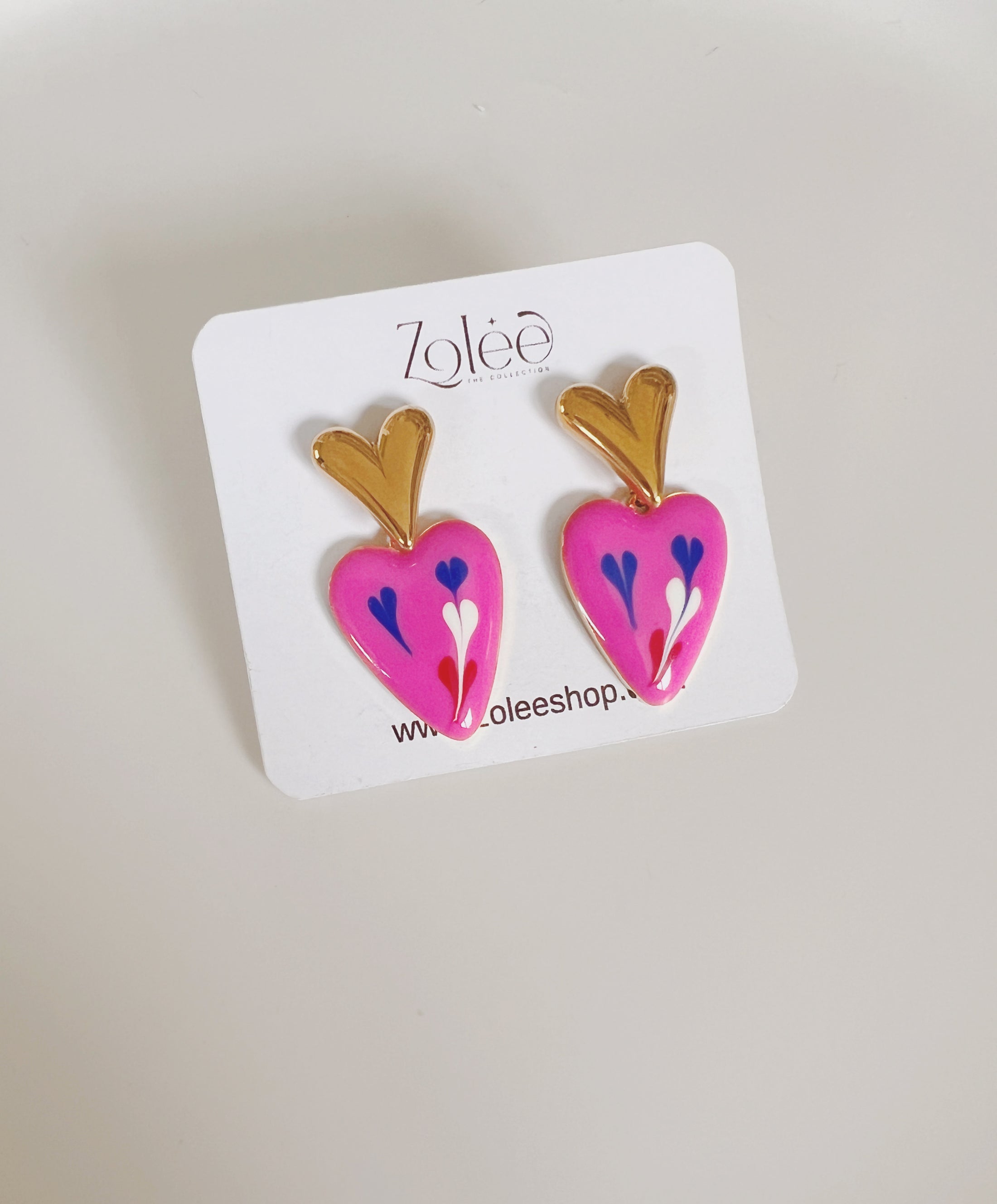 Pinky heart studs