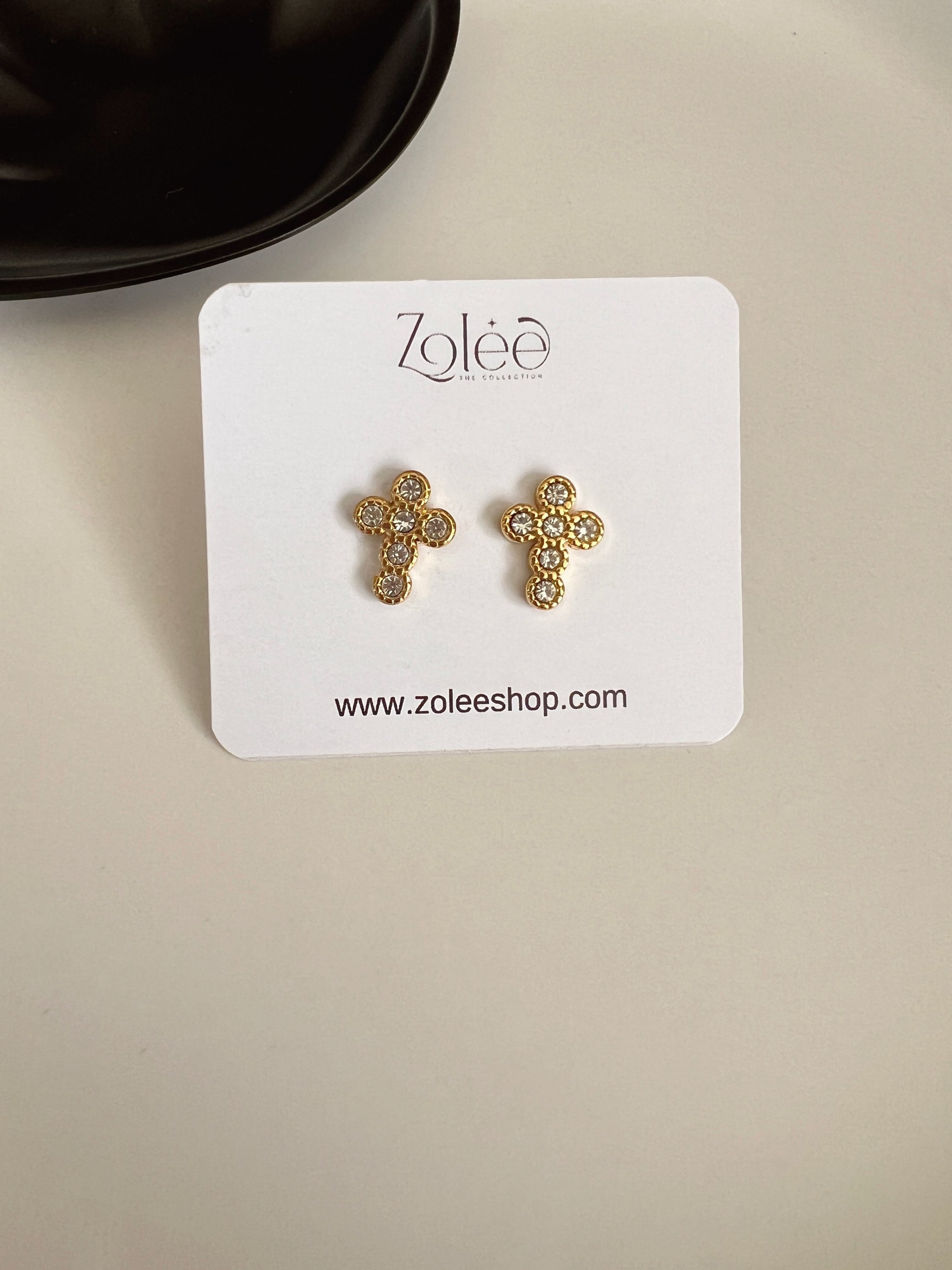 Shiny cross studs