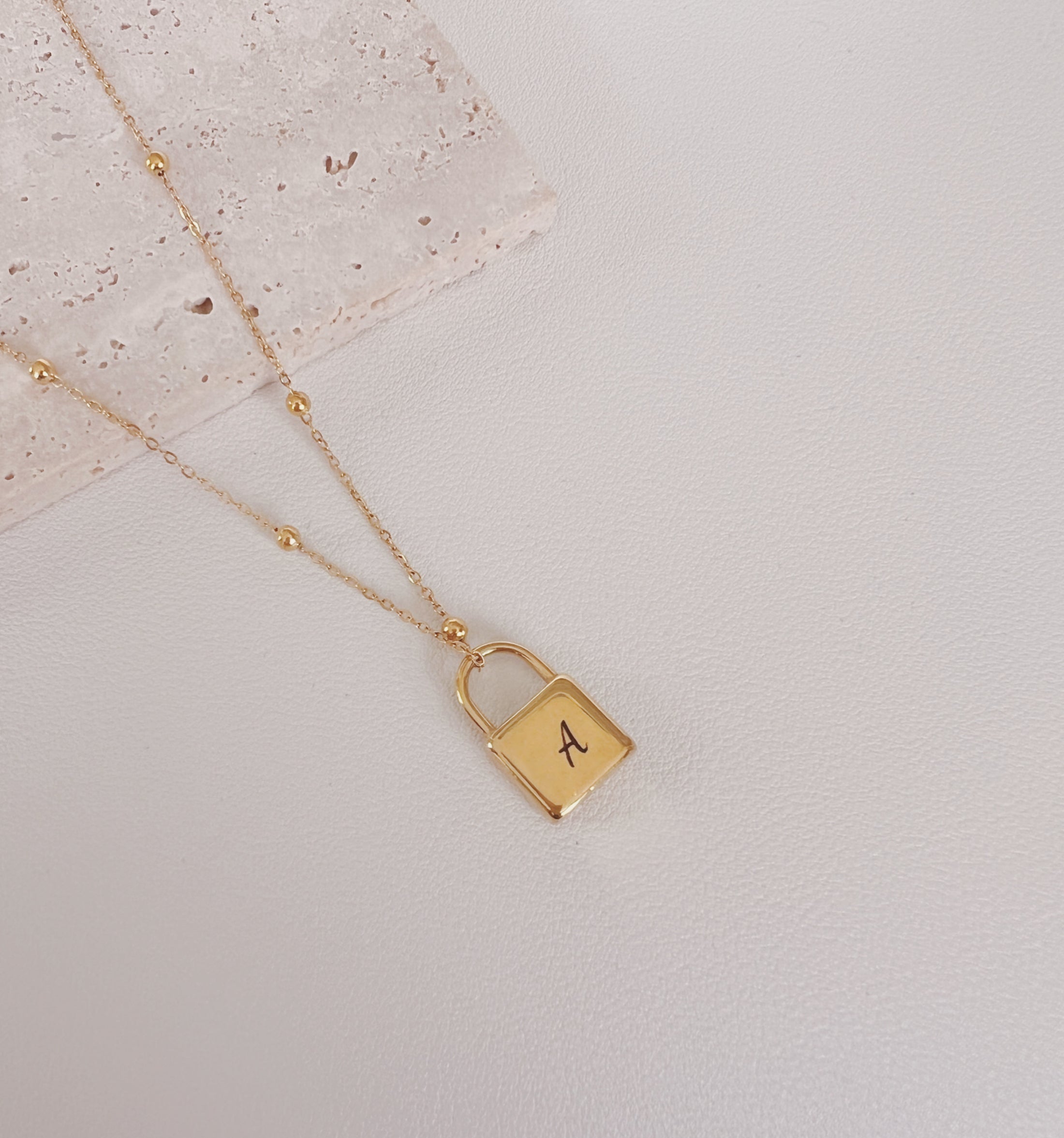 Lock monogram necklace