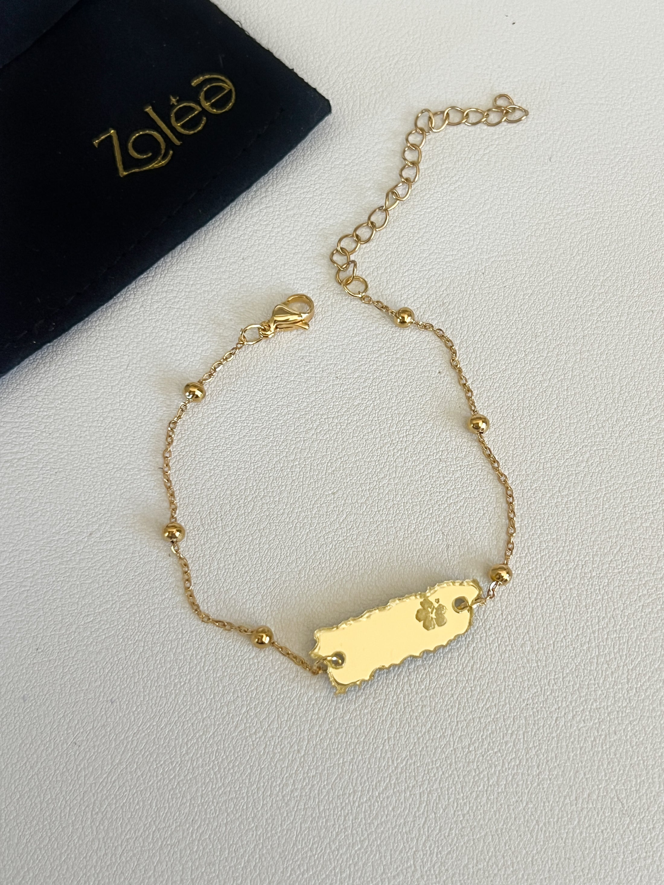 PR gold bracelet